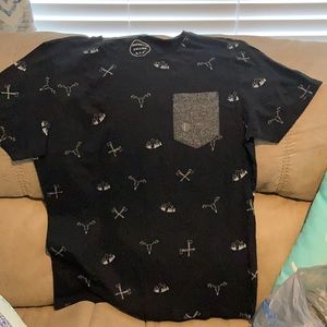 Young men’s large shirt.Black with gray pocket.